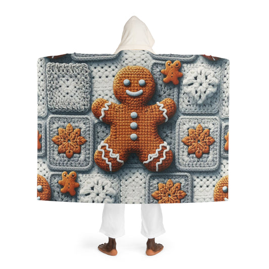 お祝いのジンジャーブレッドチャーム：グラニースクエアとスノーフレークのアクセントが付いたクリスマスのかぎ針編みあみぐるみ - フード付きシェルパフリースブランケット
