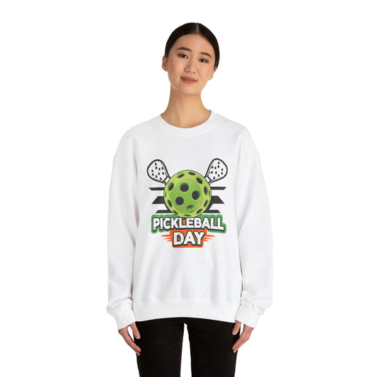 Dynamic Pickleball Day Design with Crossed Paddles and Ball Graphic - Unisex Heavy Blend™ Crewneck Sweatshirt