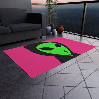 The Visitor Green Alien Black Hoodie Pink Background Outdoor Rug