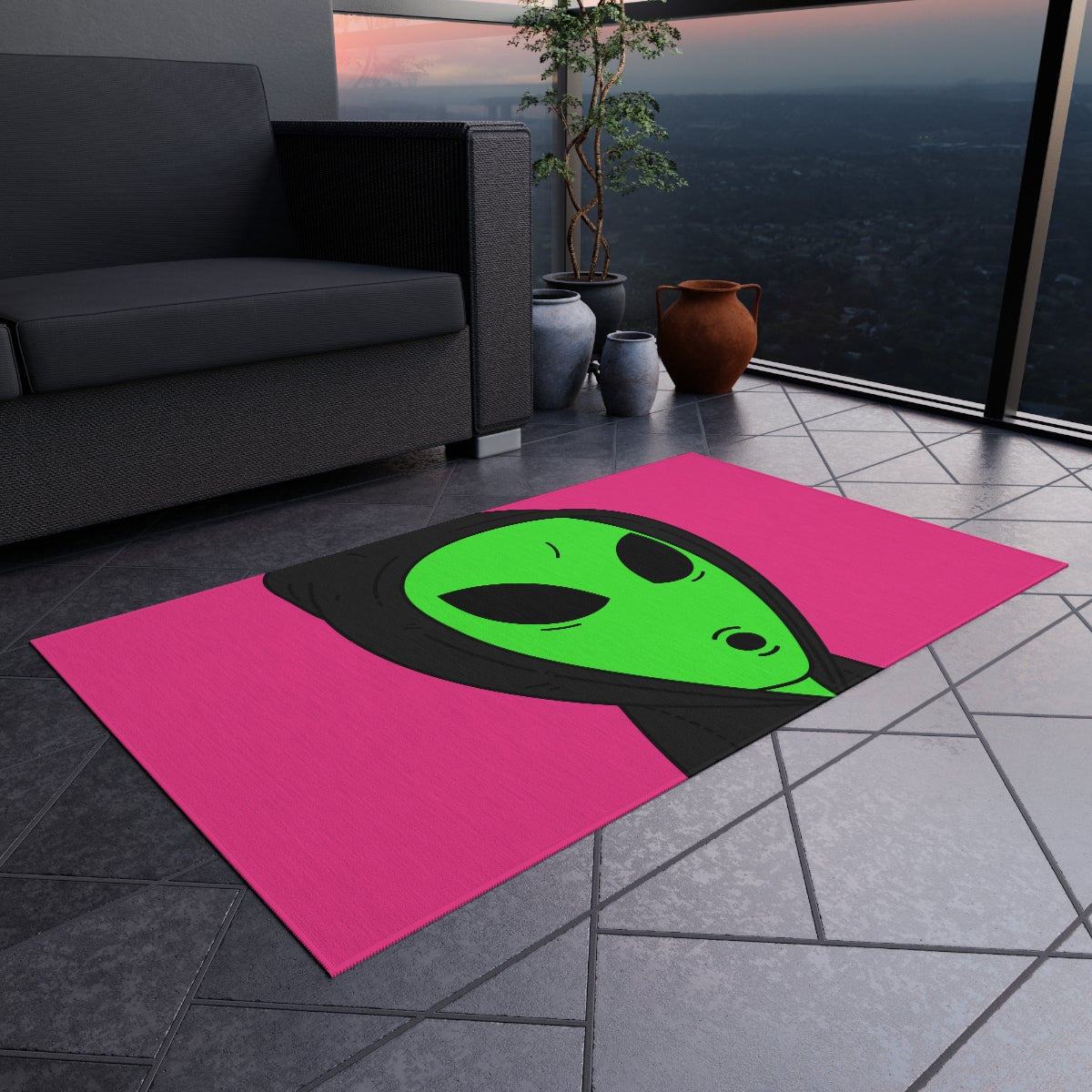 The Visitor Green Alien Black Hoodie Pink Background Outdoor Rug