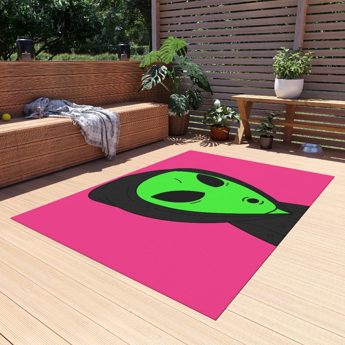 The Visitor Green Alien Black Hoodie Pink Background Outdoor Rug