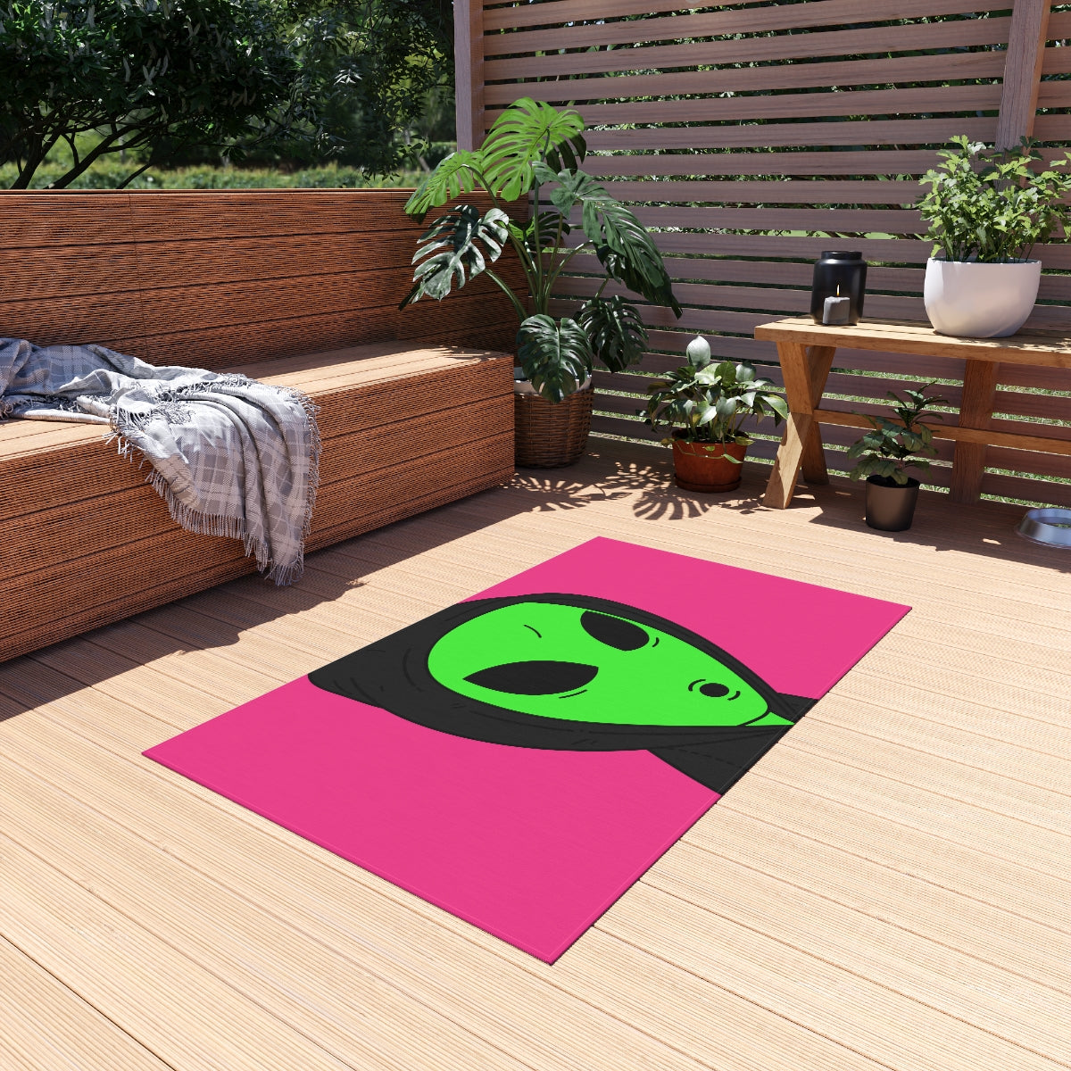 The Visitor Green Alien Black Hoodie Pink Background Outdoor Rug