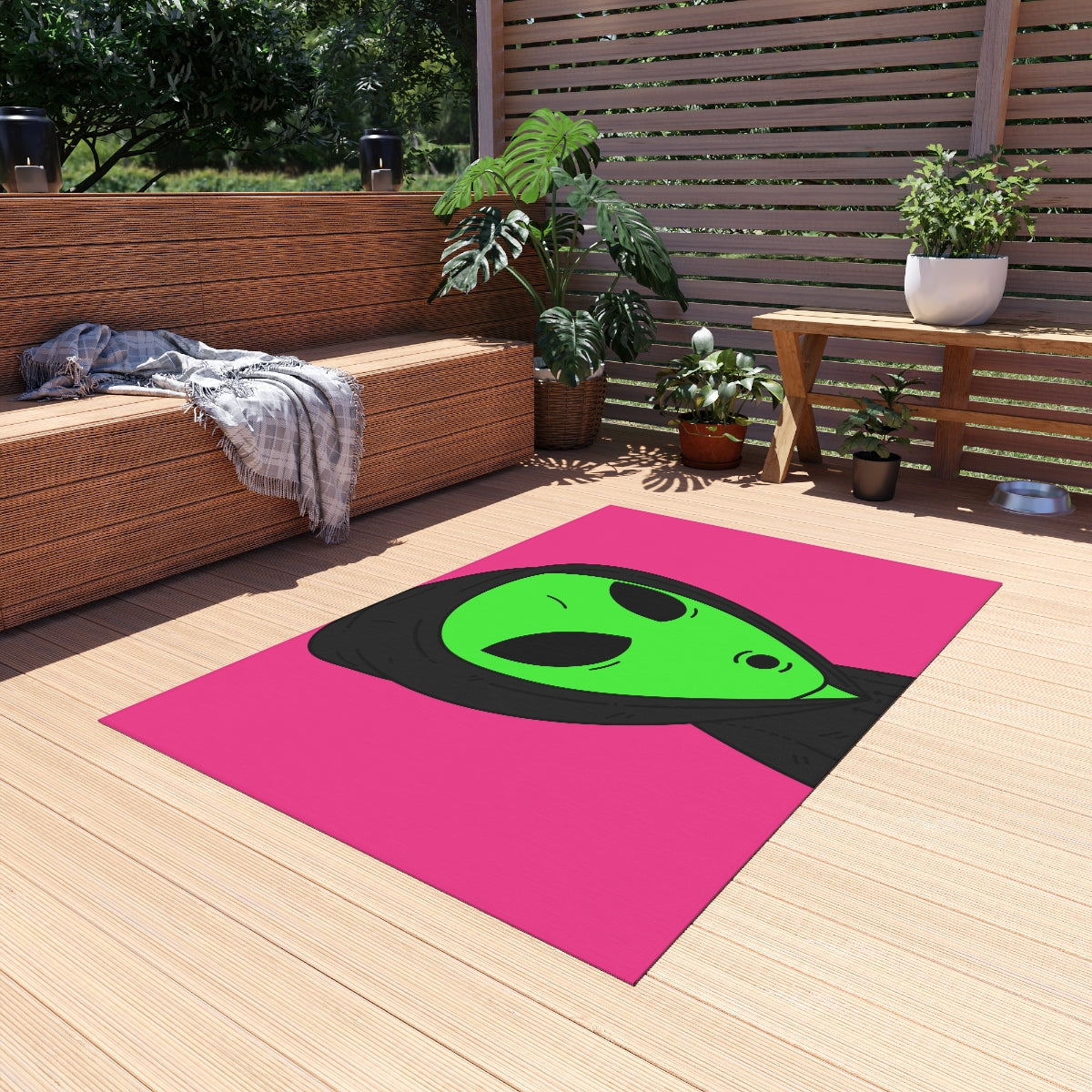 The Visitor Green Alien Black Hoodie Pink Background Outdoor Rug